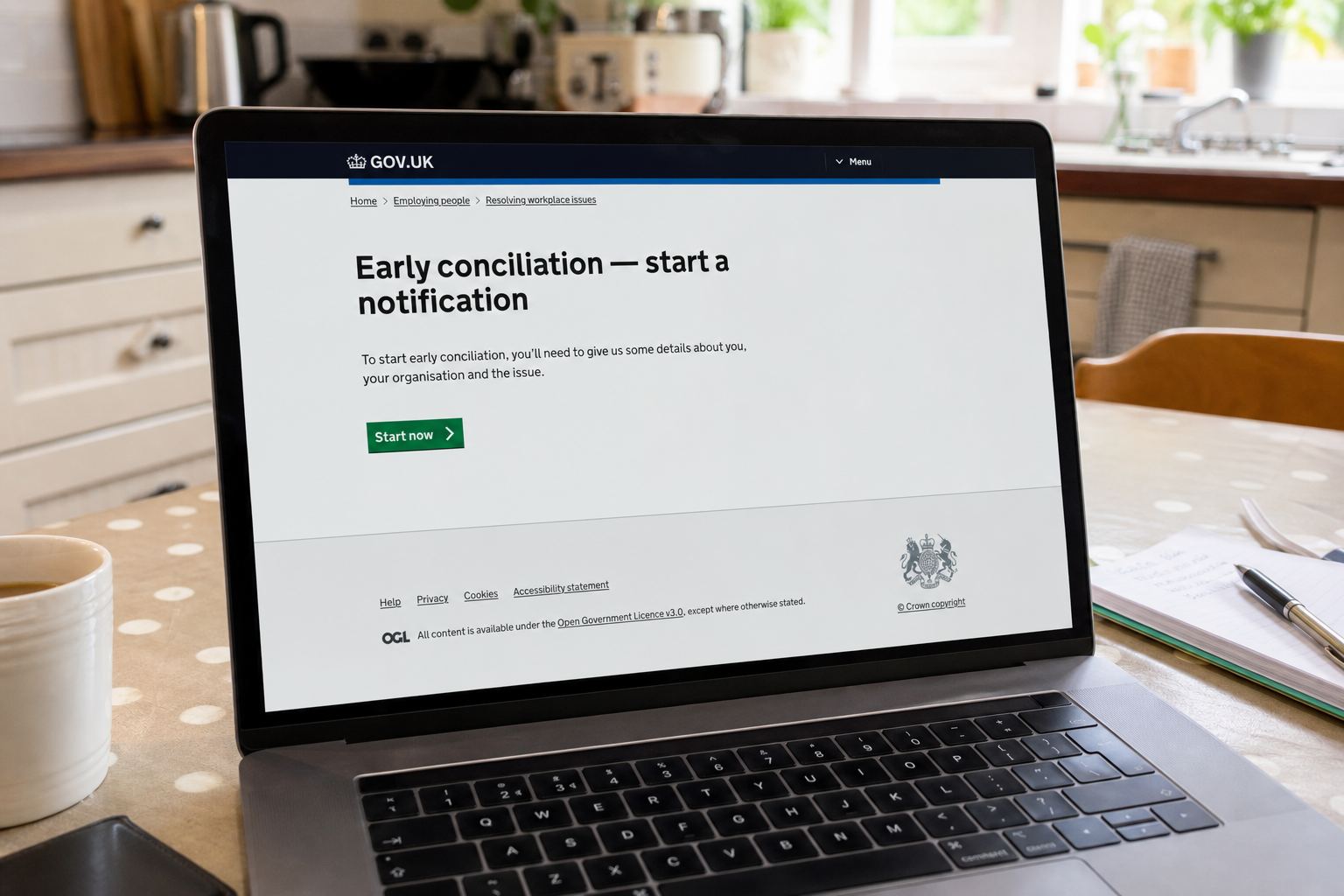 A laptop open to an early conciliation start page.